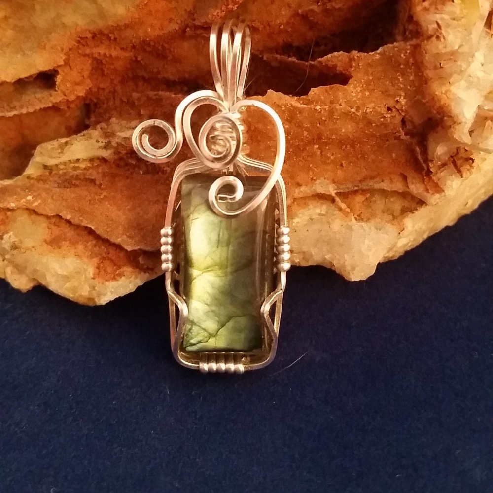 Handmade wire wrapped stone pendant